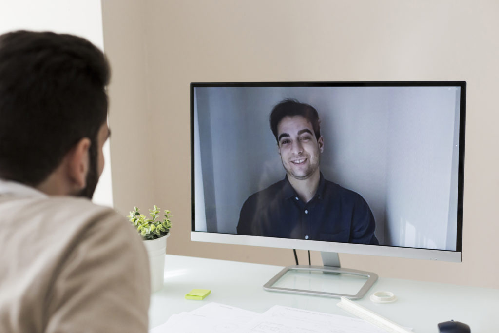 https://campaign-image.com/zohocampaigns/224452000002902004_zc_v61_1603733473003_unrecognizable_man_having_video_conversation_1024x683.jpg